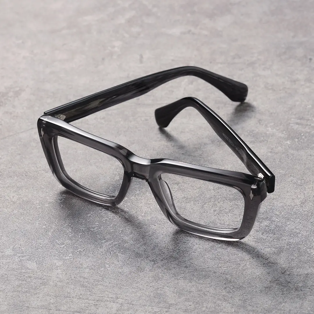Scene close-up view of Jean rectangle acetate eyeglasses EA0062305 in silver