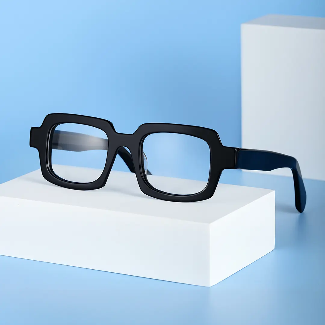 Scene close-up view of Maye rectangle acetate eyeglasses EA0072302 in black