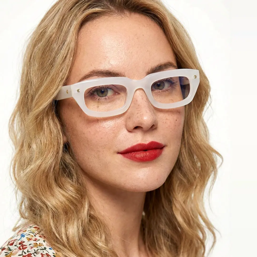 Three-quarter view of female wearing nerd white rectangle eyeglasses, natural smile, EA0072305
