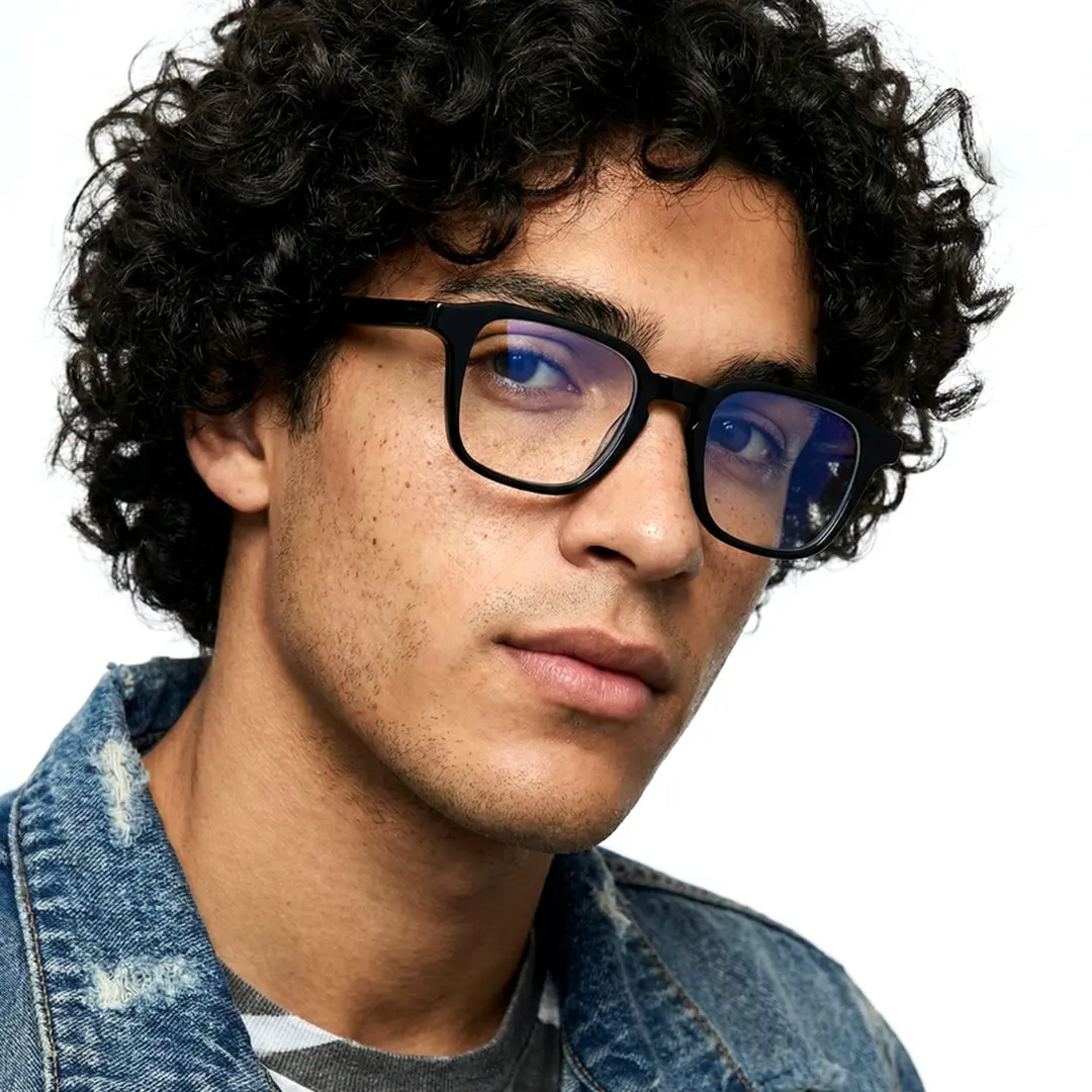 Front view of male wearing vintage black rectangle eyeglasses, natural expression, EA0122509