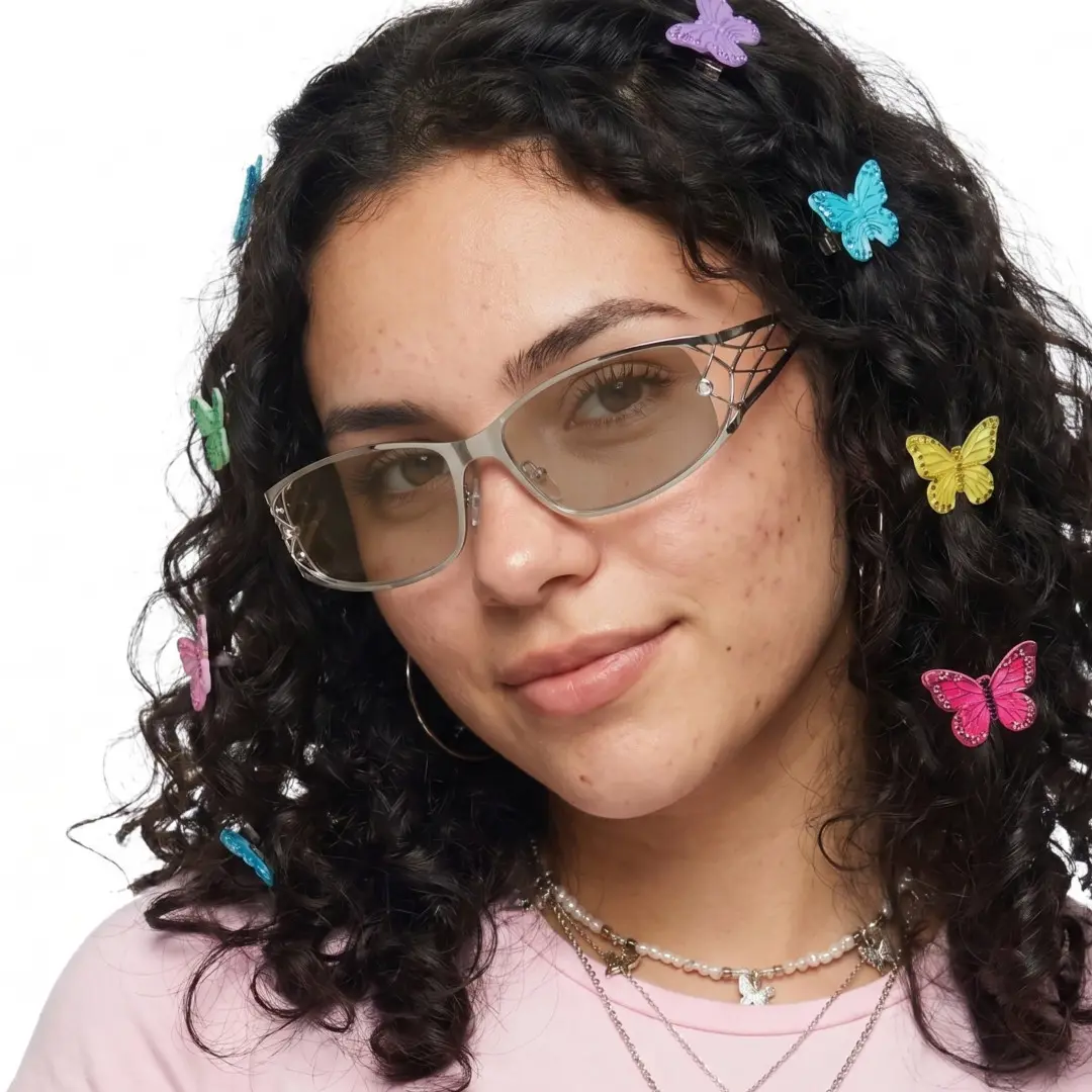 Front view of female wearing y2k silver rectangle sunglasses, tilting head, natural smile, EM0032604