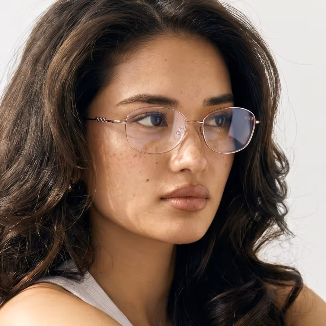 Female wearing purple rectangle metal eyeglasses, neutral expression. SPU: EM0062604