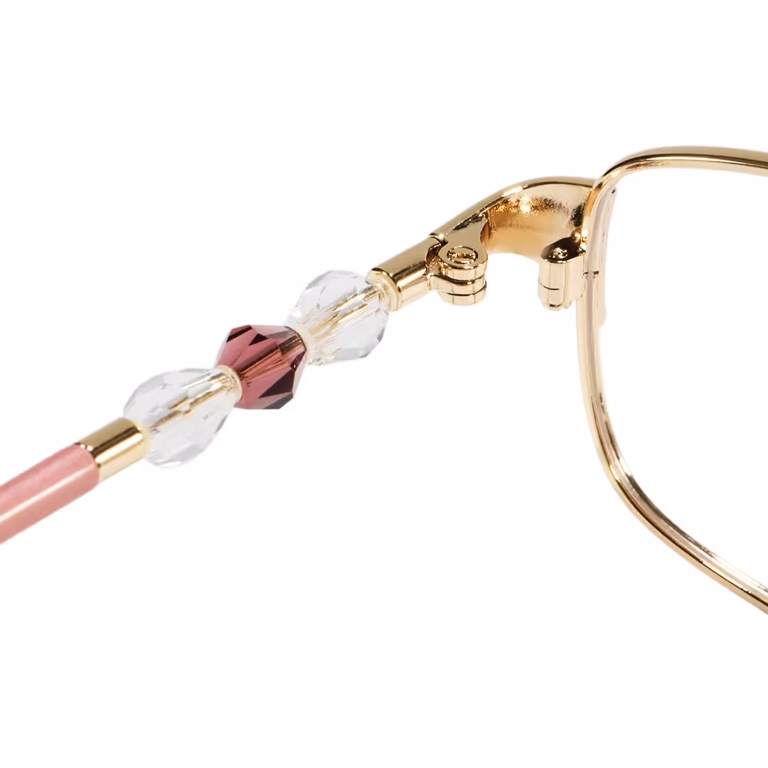 Hinge detail of Liana rectangle metal eyeglasses EM0212605 in gold