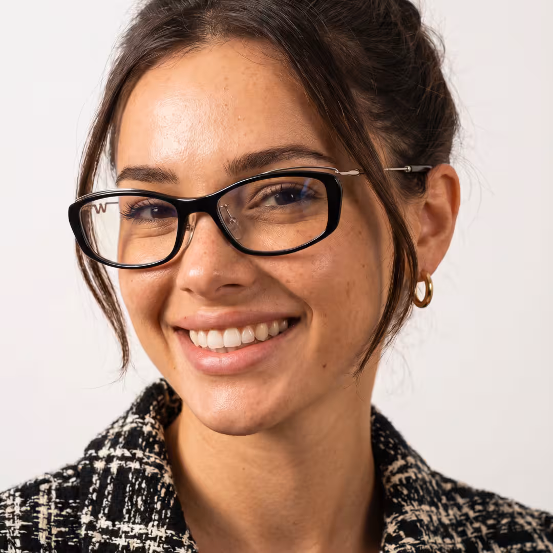 Female wearing office siren black rectangle metal eyeglasses, smiling. SPU: EM0272605