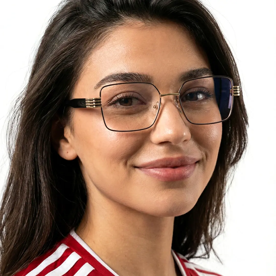 Three-quarter view of female wearing black rectangle eyeglasses, smiling, EM0332508
