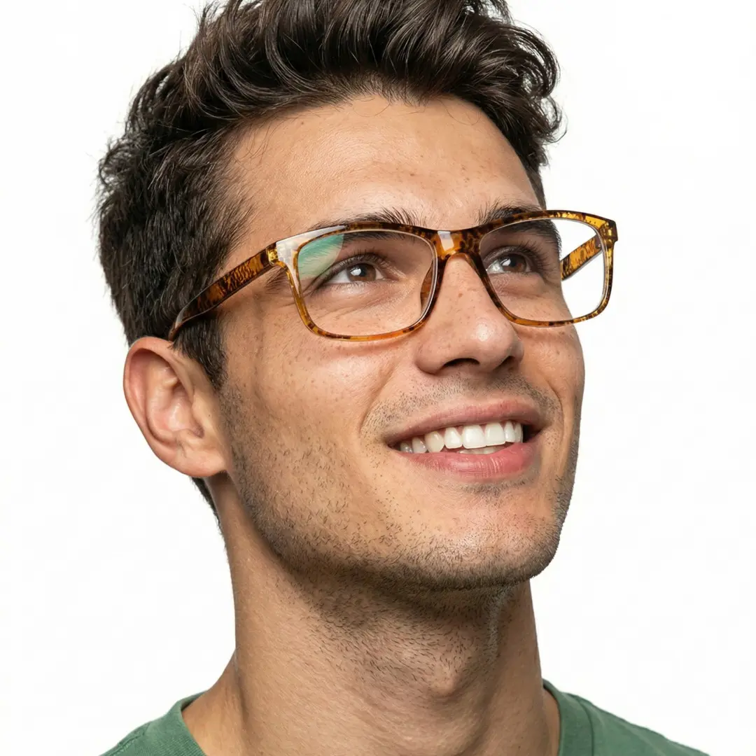 Looking away view of male wearing yellow tortoise rectangle eyeglasses, smiling, EP0032410