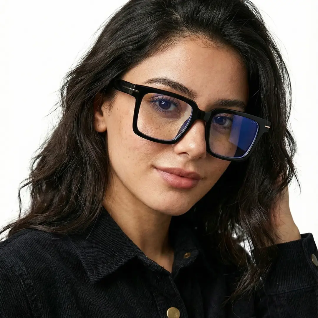 Face close-up view of female wearing black rectangle eyeglasses, hand in hair, soft smile, EP0102508