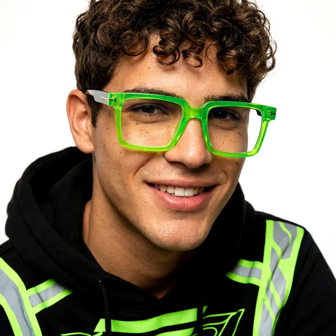 Slightly angled view of male wearing green rectangle eyeglasses, natural smile, EP0102508