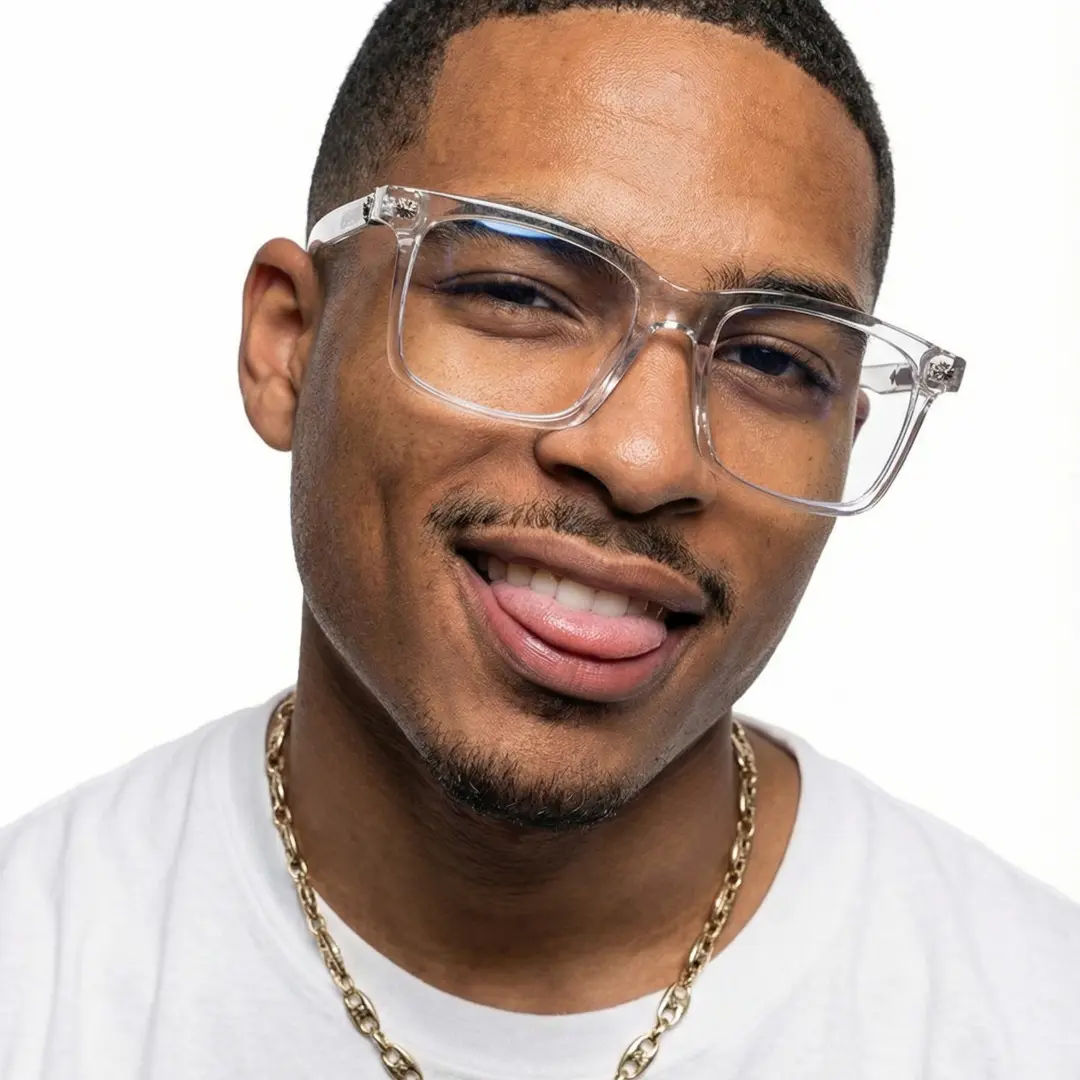 Close-up view of male wearing clear rectangle eyeglasses, sticking out tongue, confident expression, EP0212508