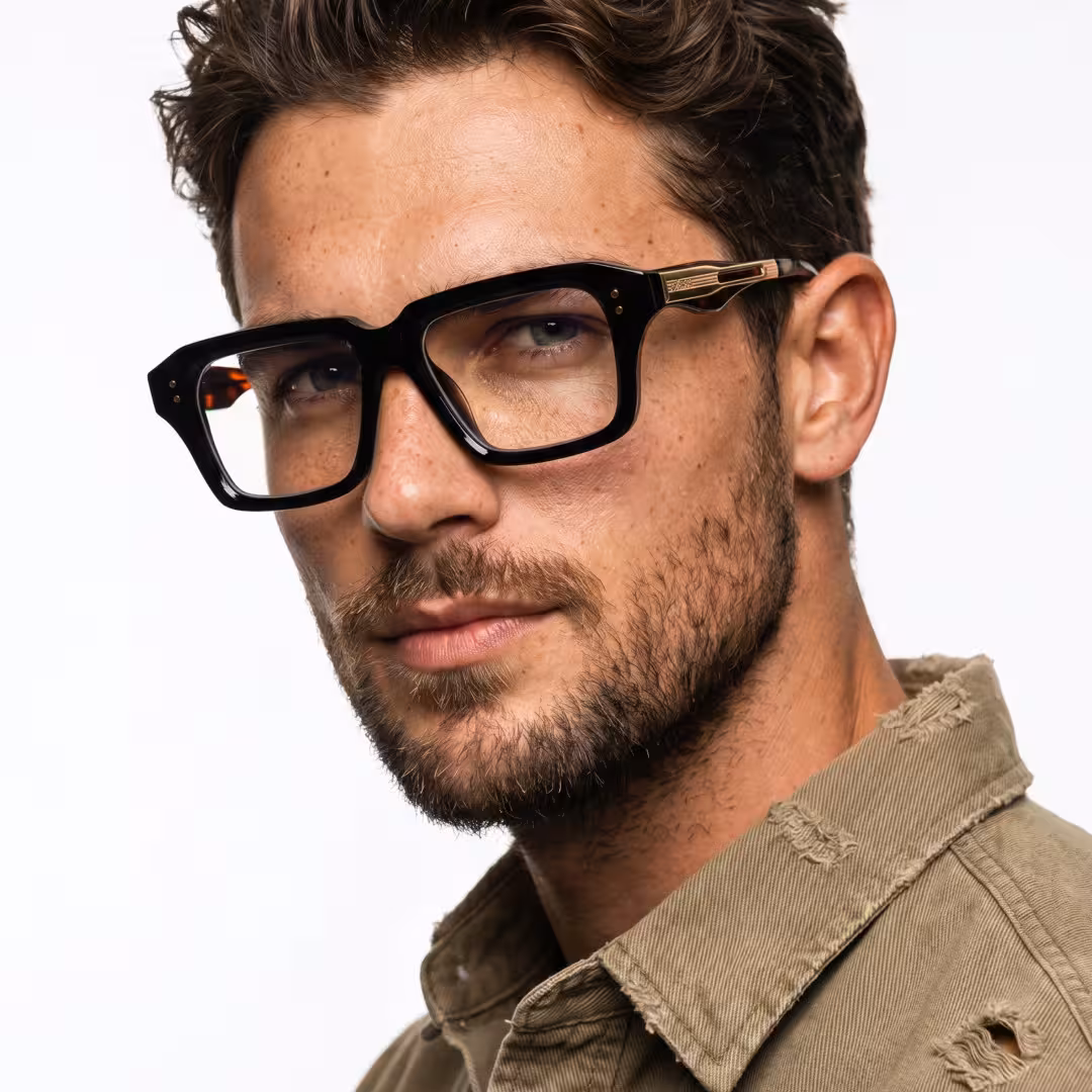 Male wearing fashion black rectangle pc eyeglasses, slightly frowning while looking at camera. SPU: EP0282508
