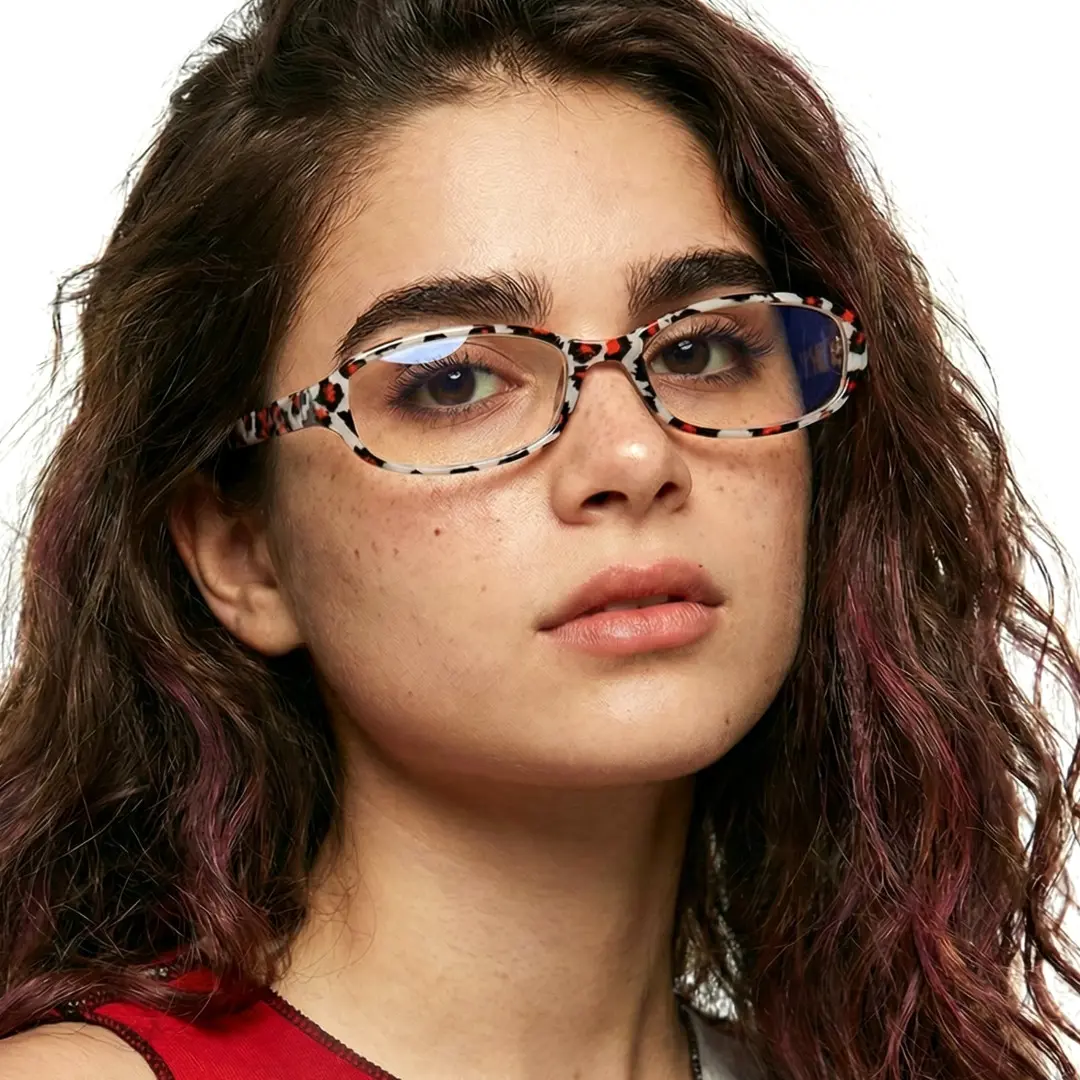Face close-up view of female wearing multicolor rectangle eyeglasses, neutral expression, EP0342601