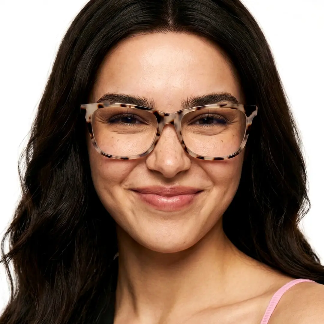 Front view of female wearing tortoise rectangle eyeglasses, soft smile, EP0482505
