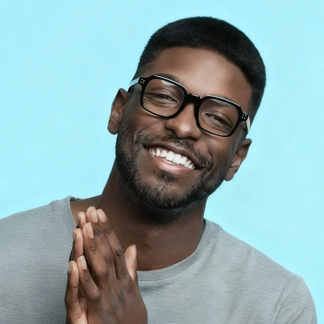 Front view of male wearing vintage black rectangle eyeglasses, smiling, EP0502509