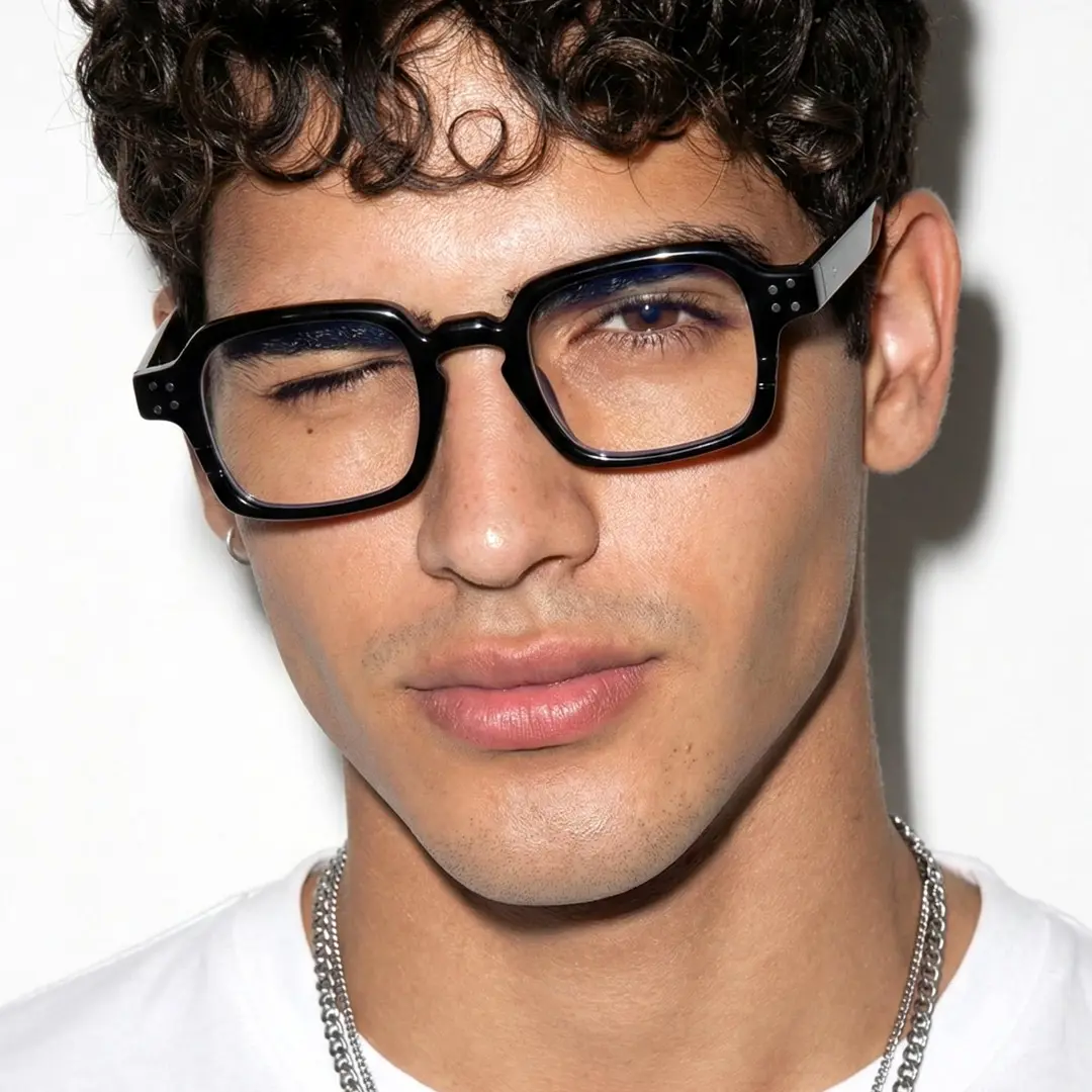 Front view of male wearing vintage black rectangle eyeglasses, winking, relaxed expression, EP0502509