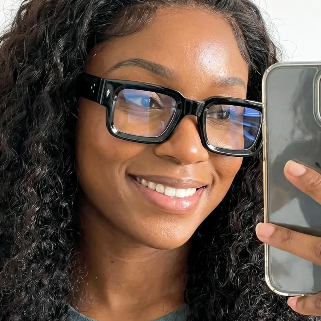 Front view of fashion black rectangle eyeglasses, natural smile, EP0542509