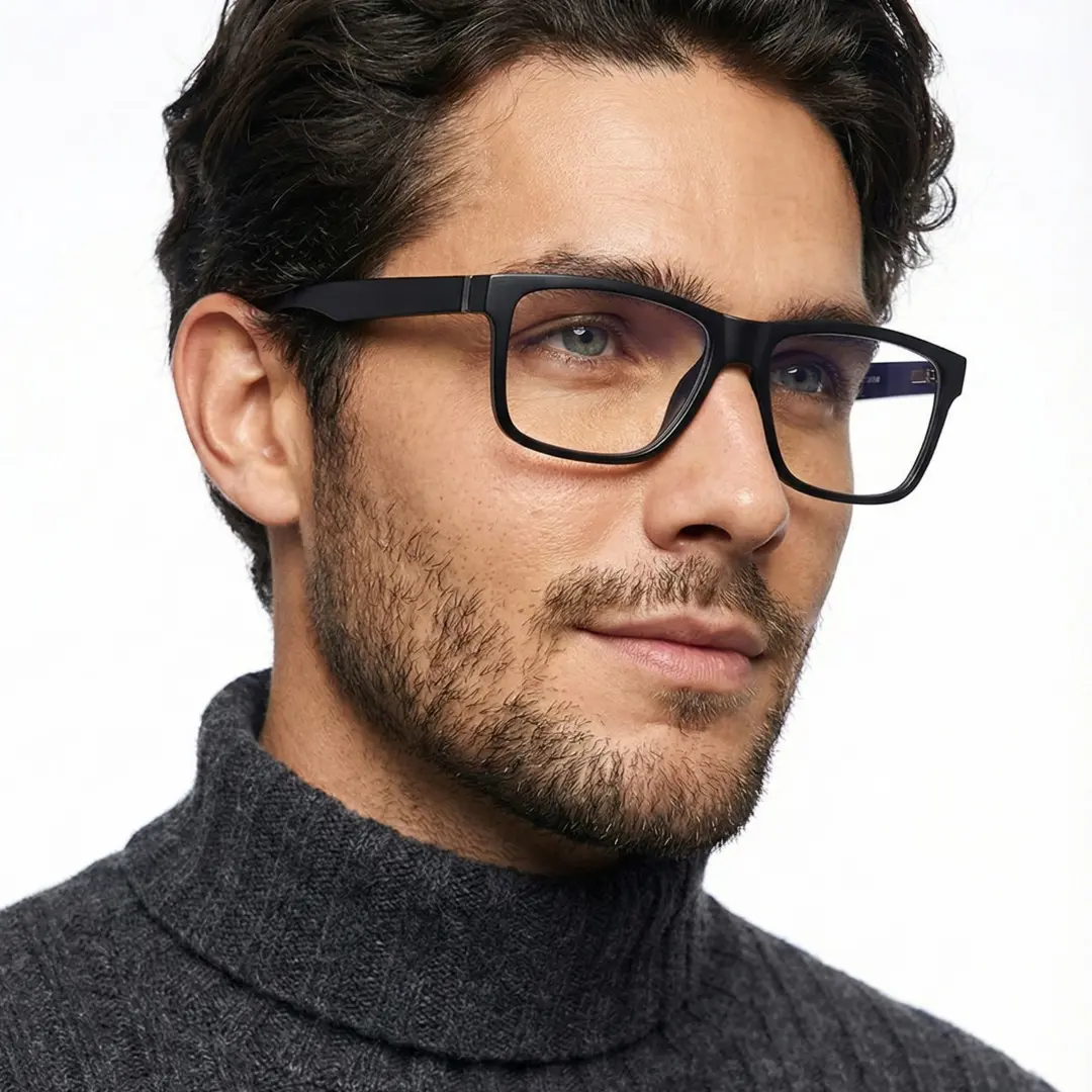Looking away view of male wearing black rectangle eyeglasses, neutral expression, ER0012512