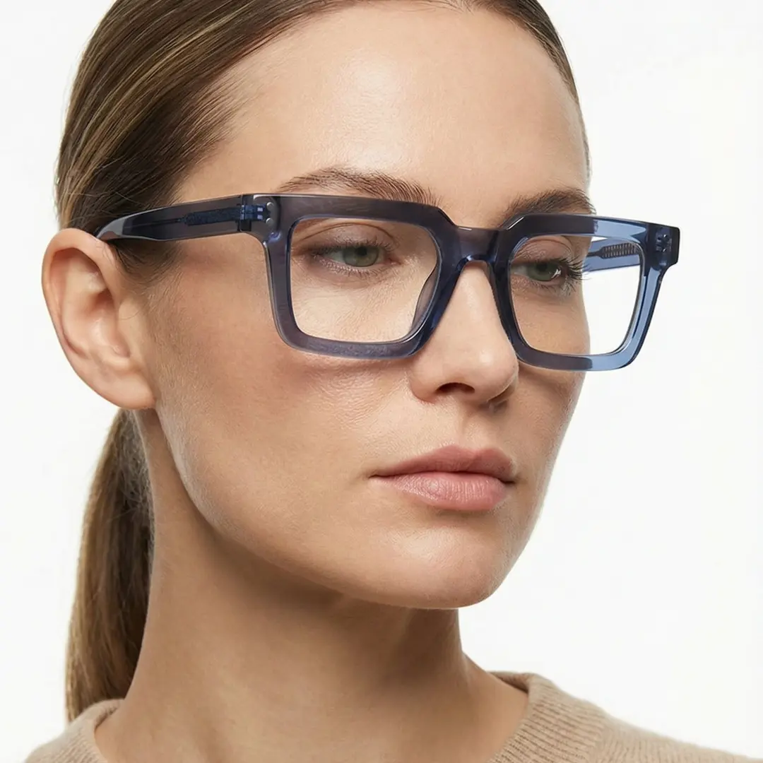 Profile view of male wearing blue rectangle eyeglasses, natural expression, ER0022406