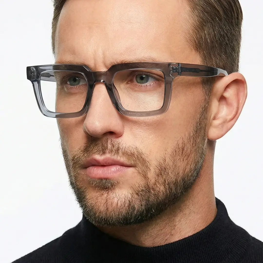 Looking away view of male wearing grey rectangle eyeglasses, neutral expression, ER0022406