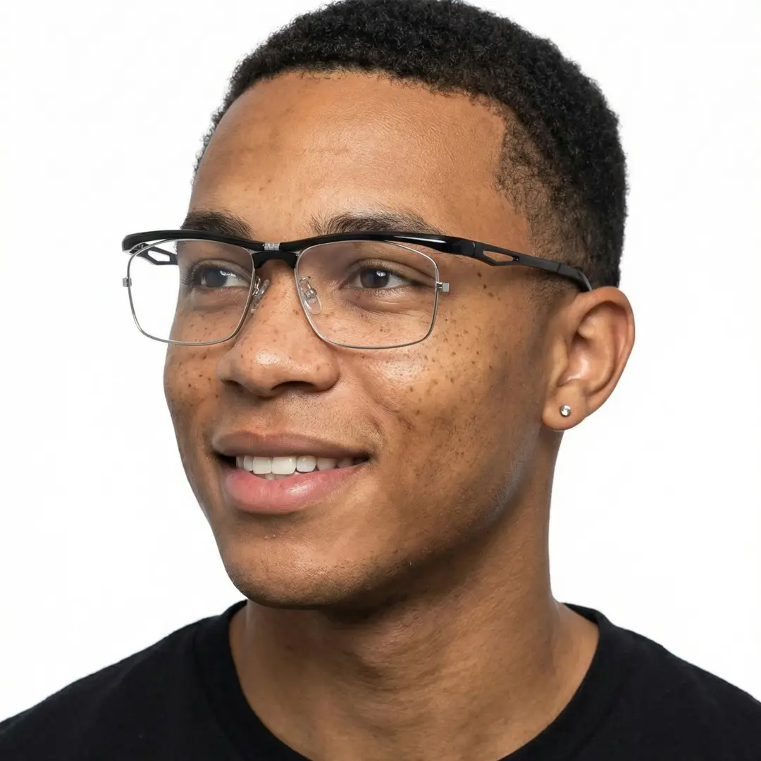 Looking away view of male wearing black rectangle eyeglasses, natural smile, ER0102603
