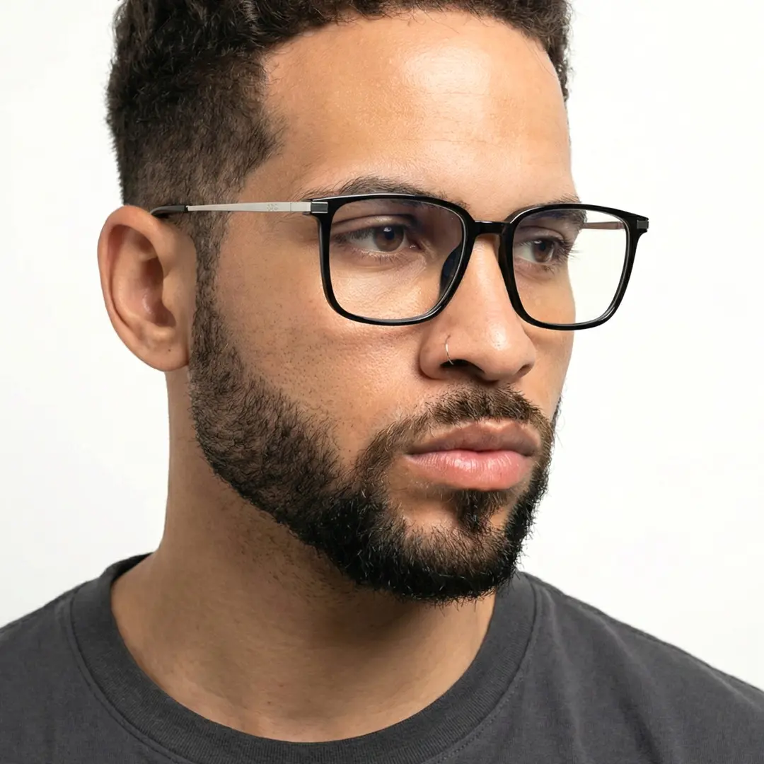 Face close-up view of male wearing black rectangle eyeglasses, confident expression, ER0172508