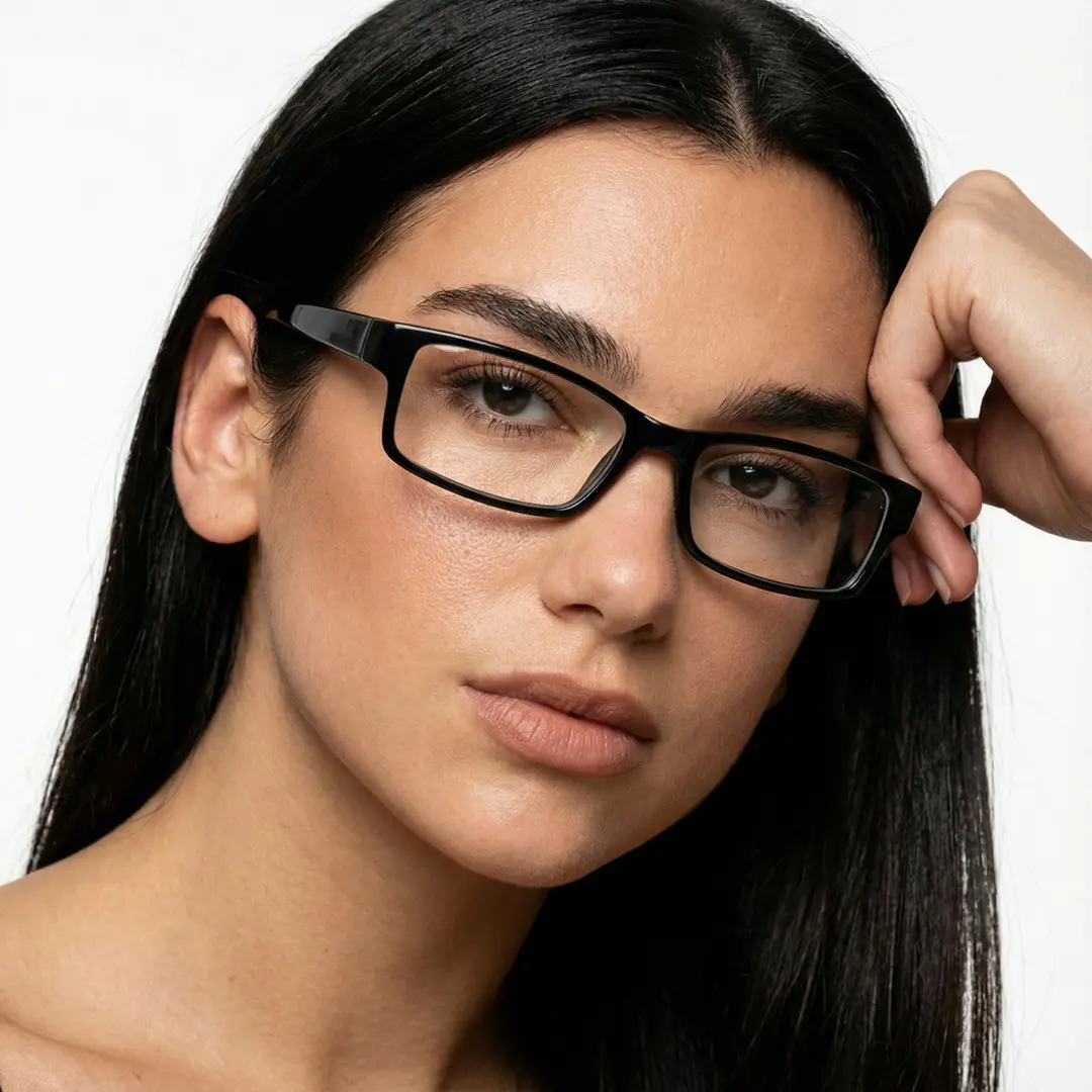 Three quarter view of female wearing black rectangle eyeglasses, hand on temple, neutral expression, ER0302412