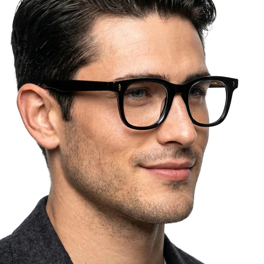 Three-quarter view of male wearing black rectangle eyeglasses, natural smile, ER0302506