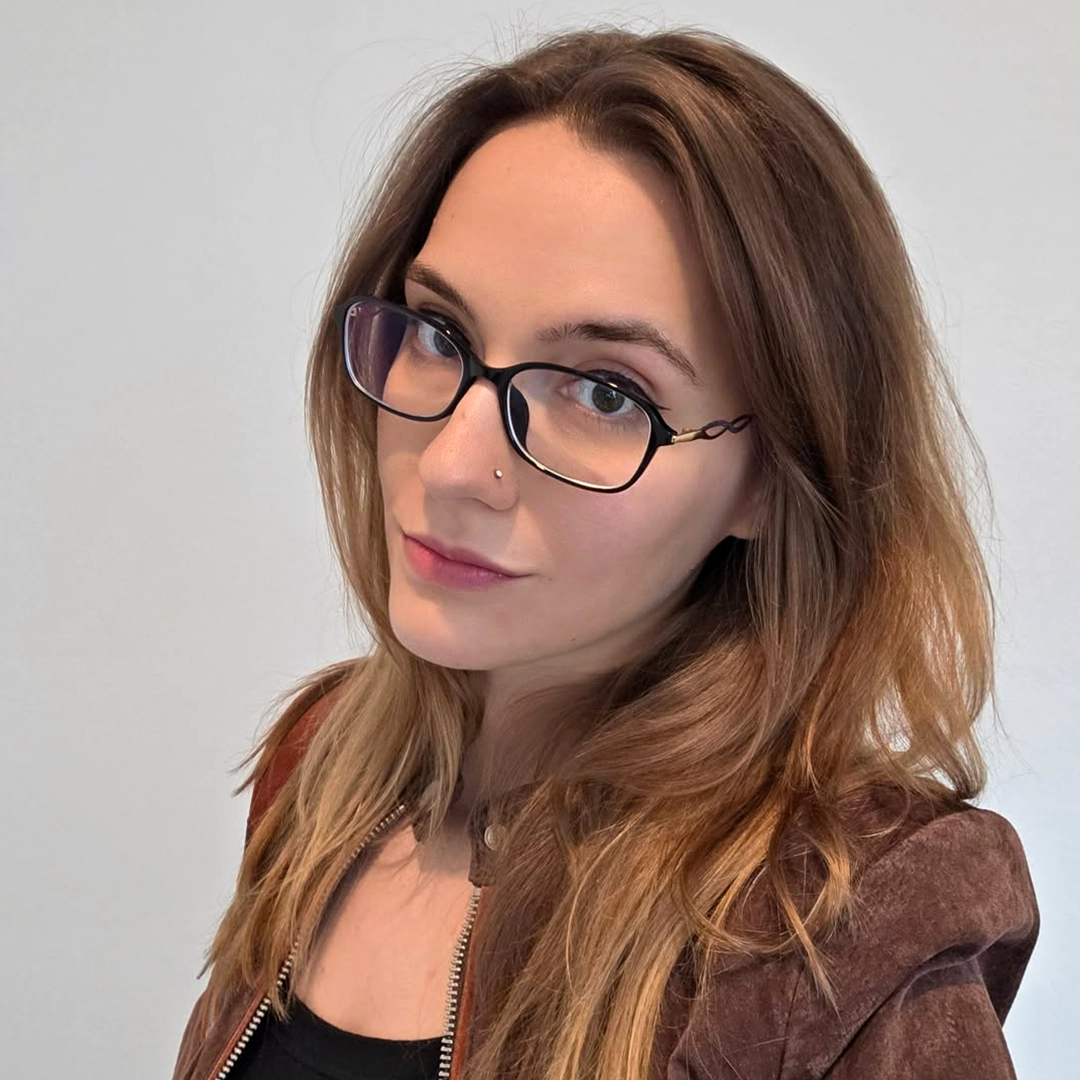 Portrait view of female wearing office siren black rectangle eyeglasses, confident expression, ER0372509