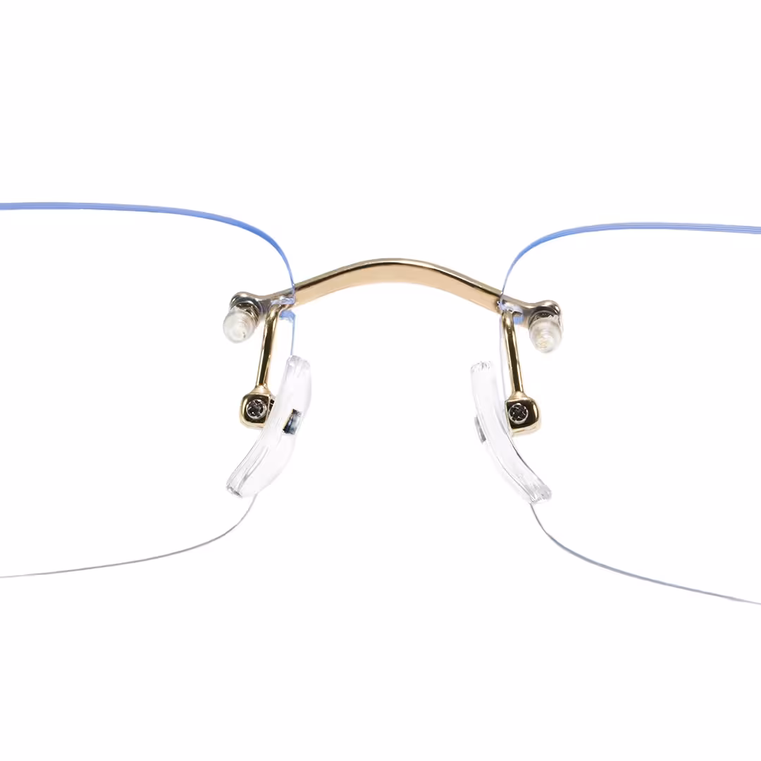 Adjustable nose pad detail of Valeo rectangle titanium eyeglasses ET0022605 in gold