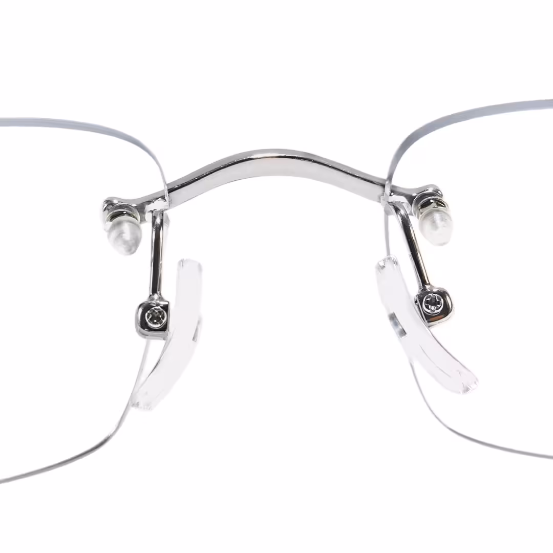 Adjustable nose pad detail of Valeo rectangle titanium eyeglasses ET0022605 in silver