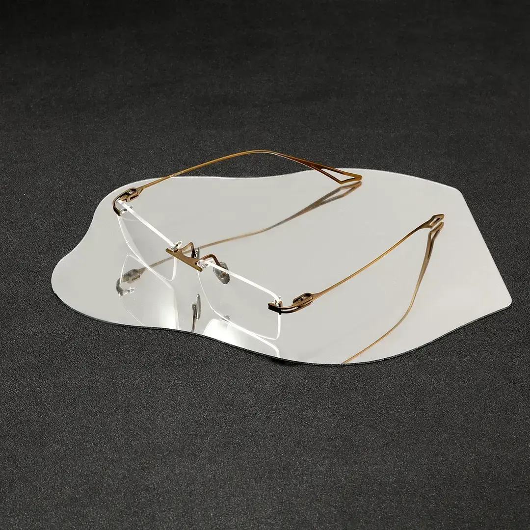 Scene view of Dusk rectangle titanium eyeglasses ET0042604 in bronze