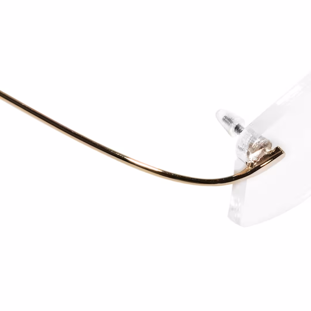 End piece detail of Pyr rectangle titanium eyeglasses ET0242605 in gold