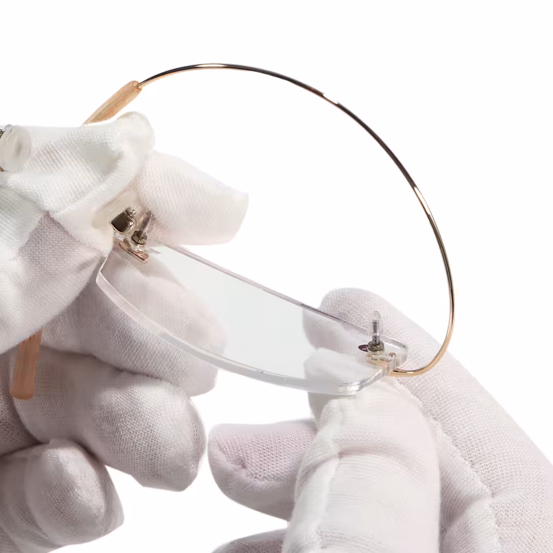 Frame detail view of Pyr rectangle titanium eyeglasses ET0242605 in gold