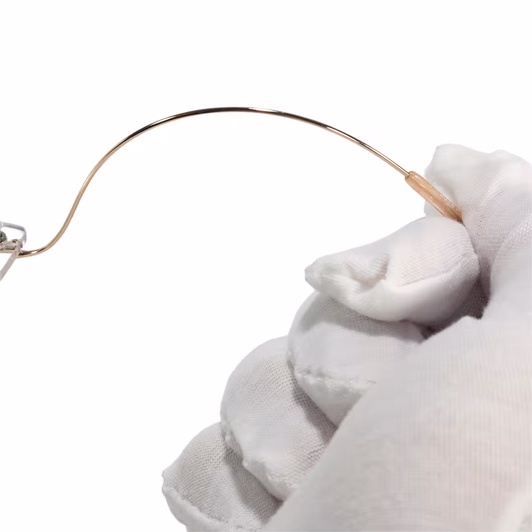 Temple detail of Pyr rectangle titanium eyeglasses ET0242605 in gold