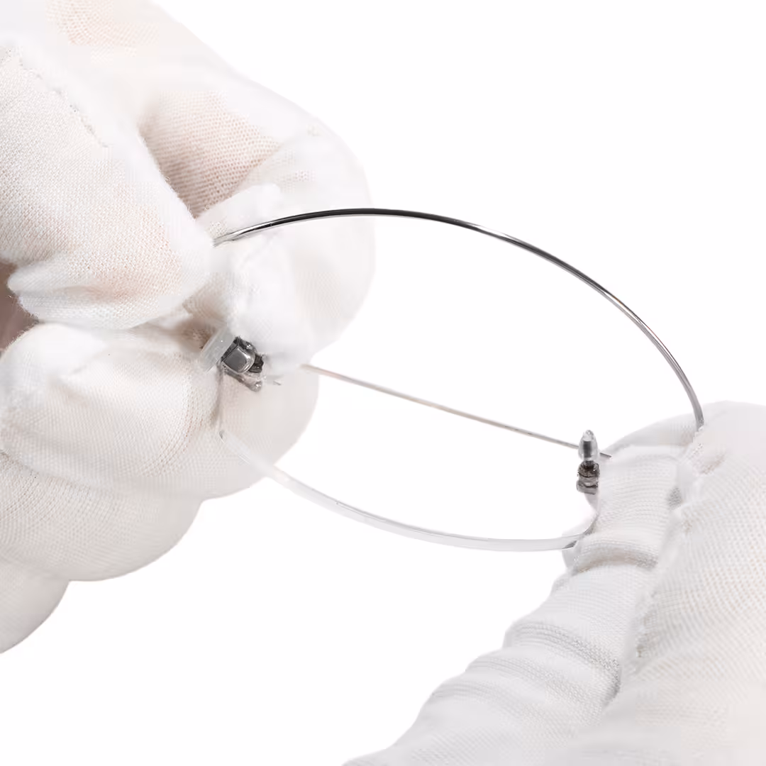 Frame detail view of Pyr rectangle titanium eyeglasses ET0242605 in silver