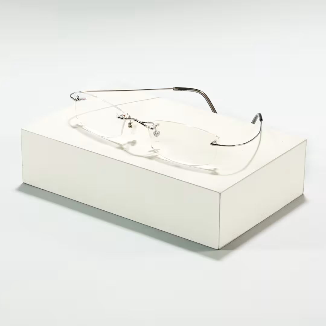Scene close-up view of Pyr rectangle titanium eyeglasses ET0242605 in silver