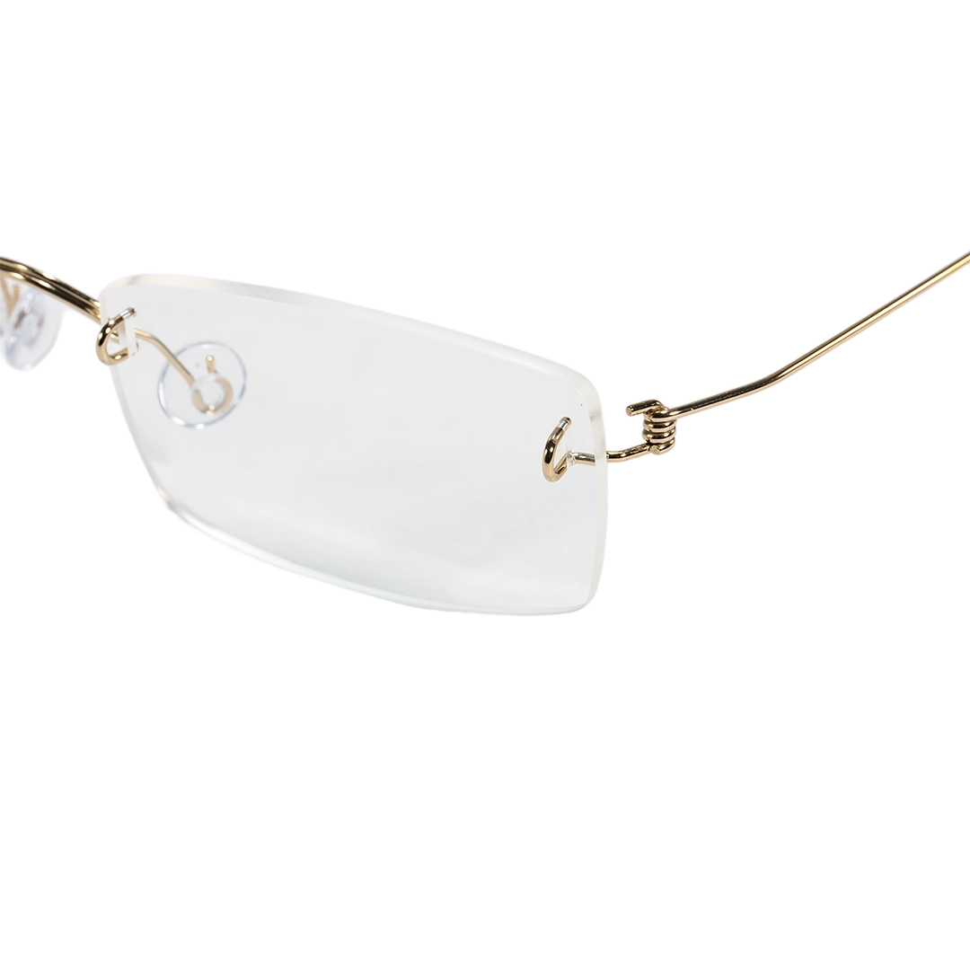 End piece detail of Urban rectangle titanium eyeglasses ET0292601 in gold