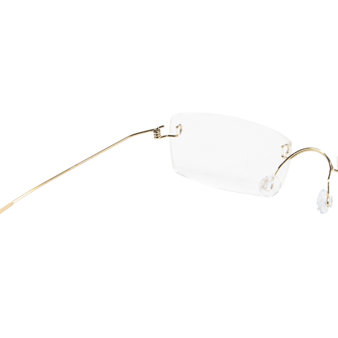 Hinge detail of Urban rectangle titanium eyeglasses ET0292601 in gold