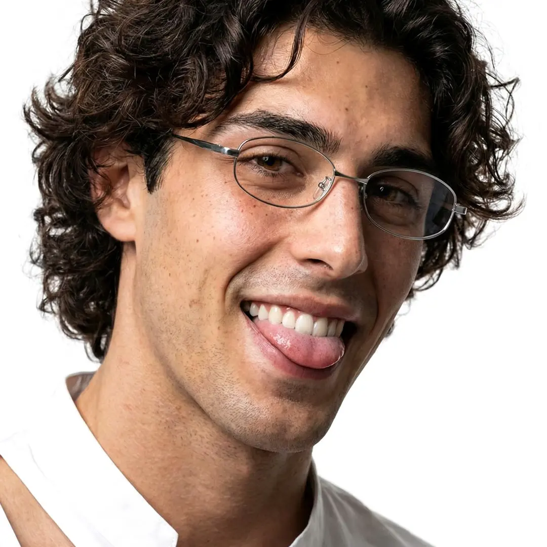 Close-up view of male wearing office siren silver rectangle eyeglasses, sticking out tongue, smiling, ET0302601