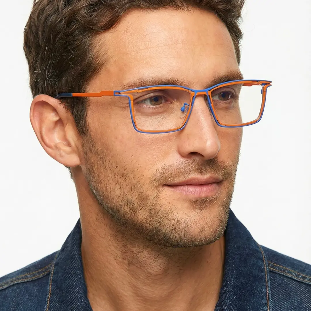 Male wearing steampunk two tone rectangle titanium eyeglasses, neutral expression. SPU: ET0352508