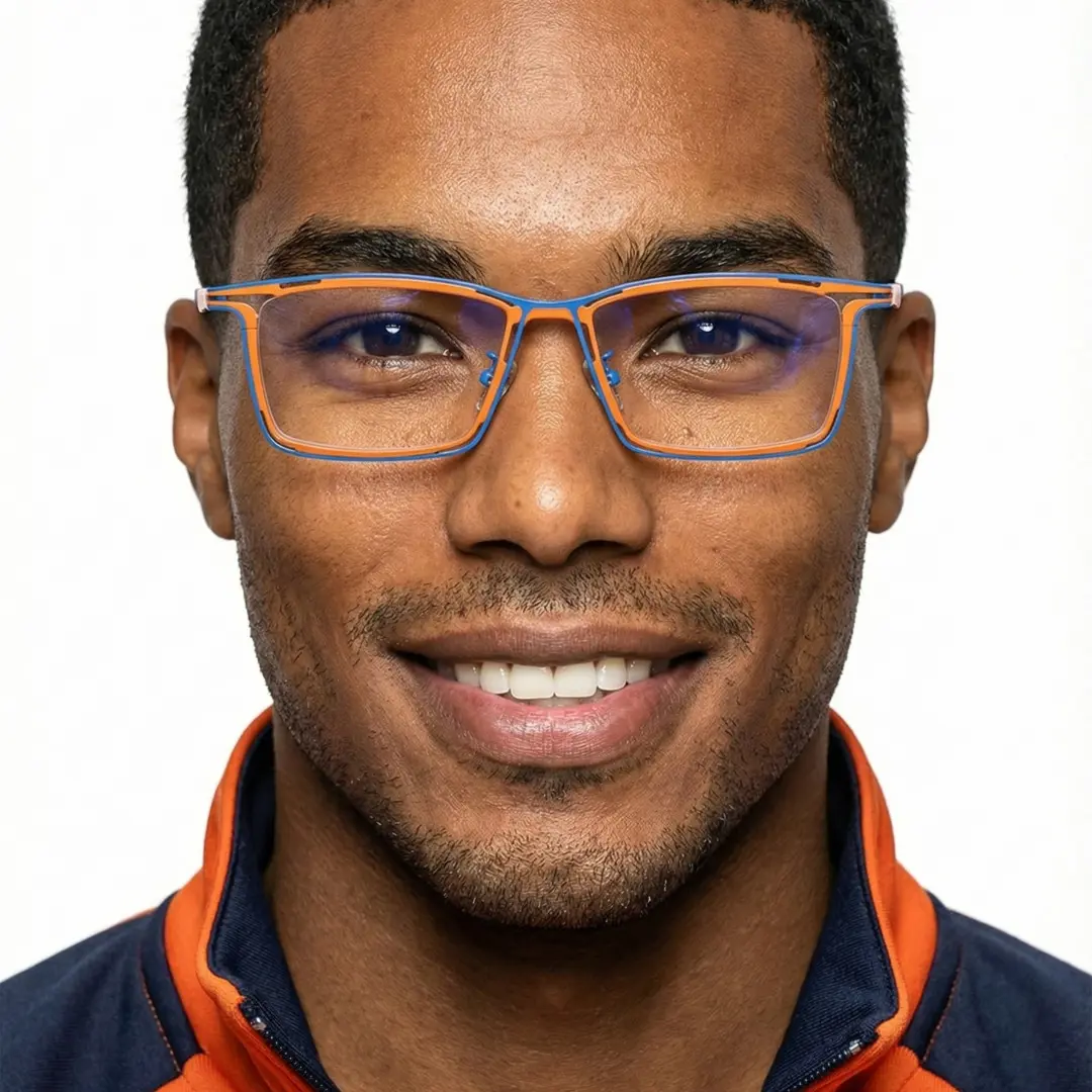 Front view of male wearing two tone rectangle eyeglasses, smiling, ET0352508