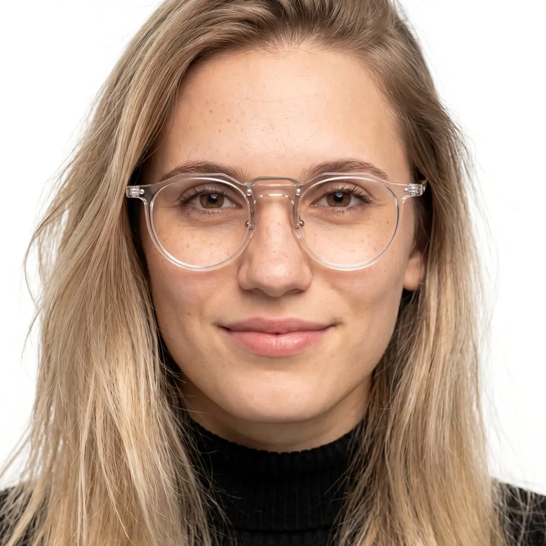 Female wearing vintage clear geometric acetate eyeglasses, natural smile. SPU: GA0022408