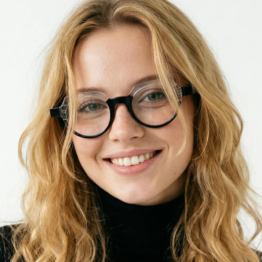 Looking straight ahead view of female wearing black geometric eyeglasses, friendly smile, GA0032209