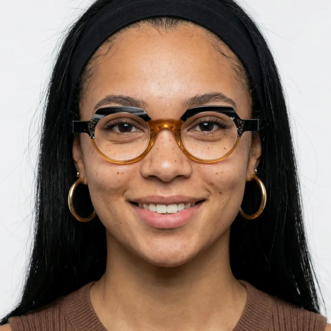 Front view of female wearing brown geometric eyeglasses, natural expression, GA0032209