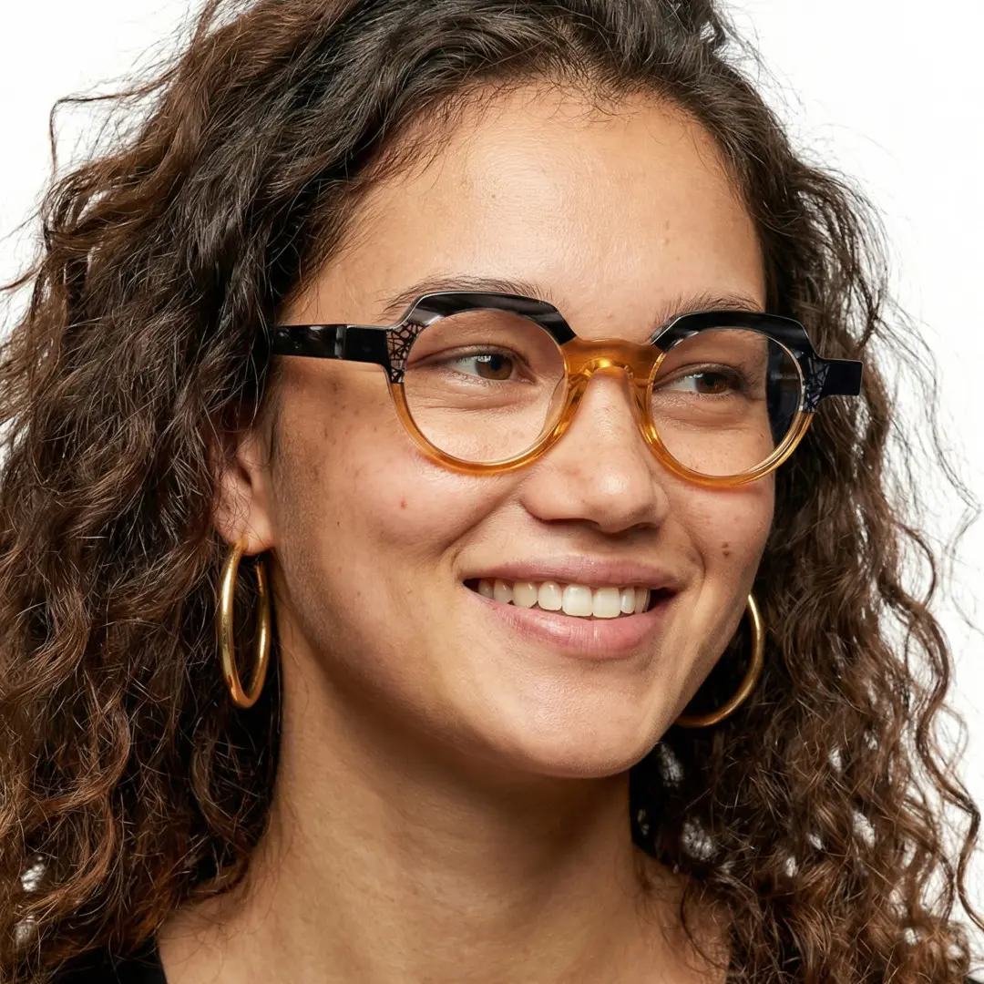 Looking away view of female wearing brown geometric eyeglasses, wide smile, GA0032209