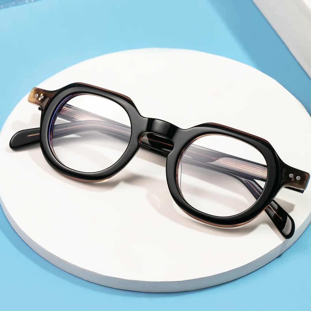 Scene close-up view of Edana geometric acetate eyeglasses GA0032301 in brown