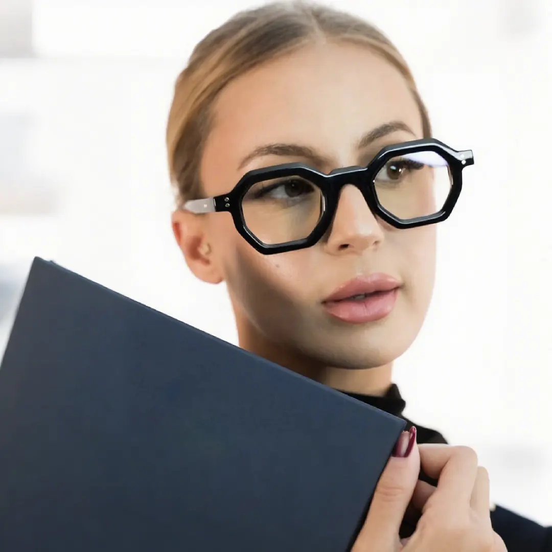 Three-quarter view of female wearing black geometric eyeglasses, natural expression, GA0052310