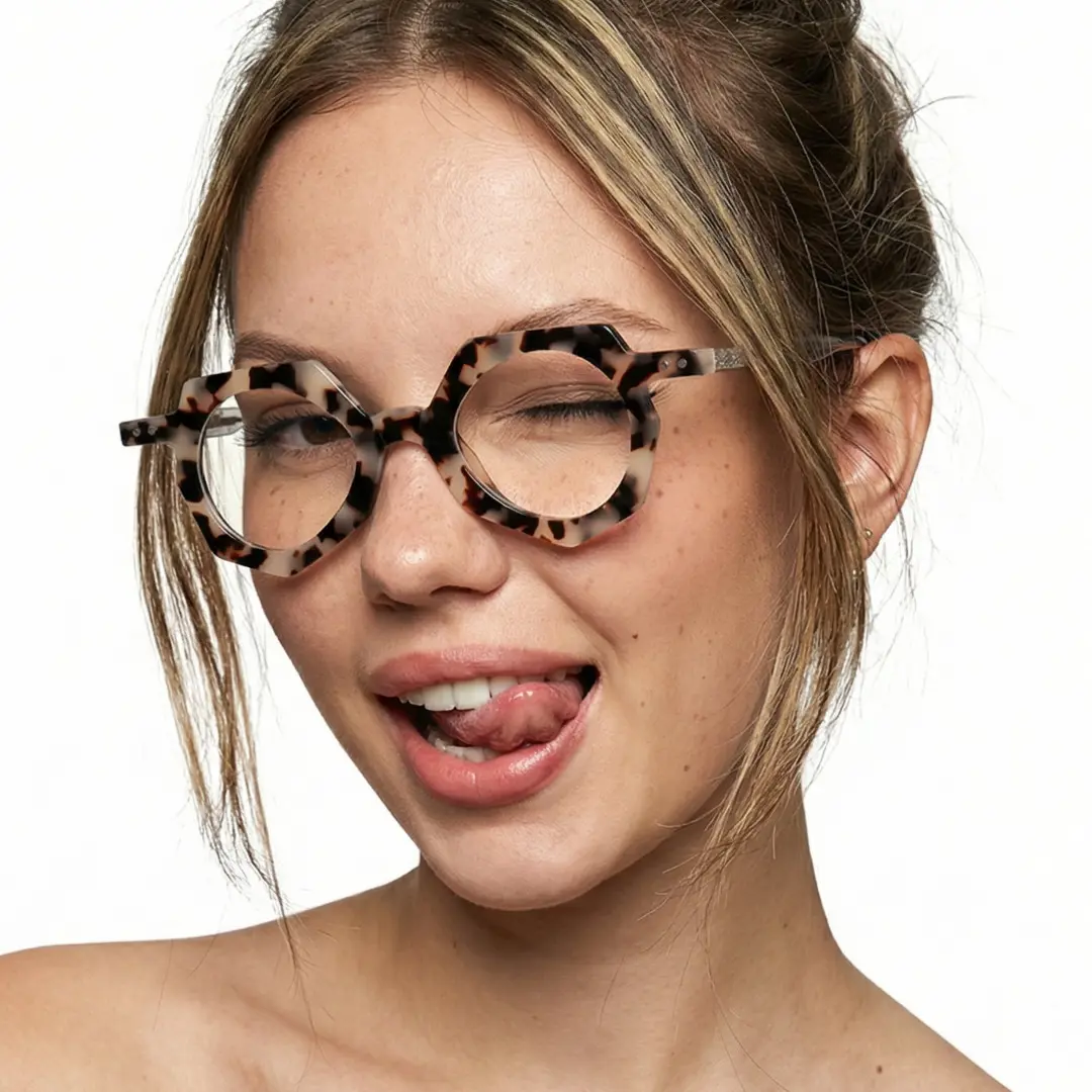 Profile view of female wearing vintage brown tortoise geometric eyeglasses, smiling, GA0062309