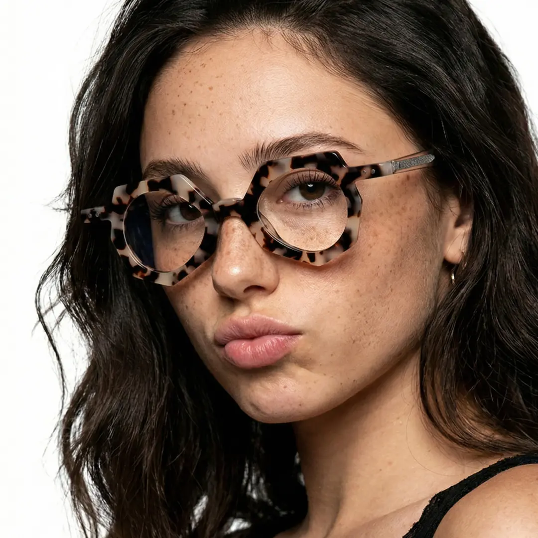 Three-quarter view of female wearing vintage brown tortoise geometric eyeglasses, pouting, natural expression, GA0062309