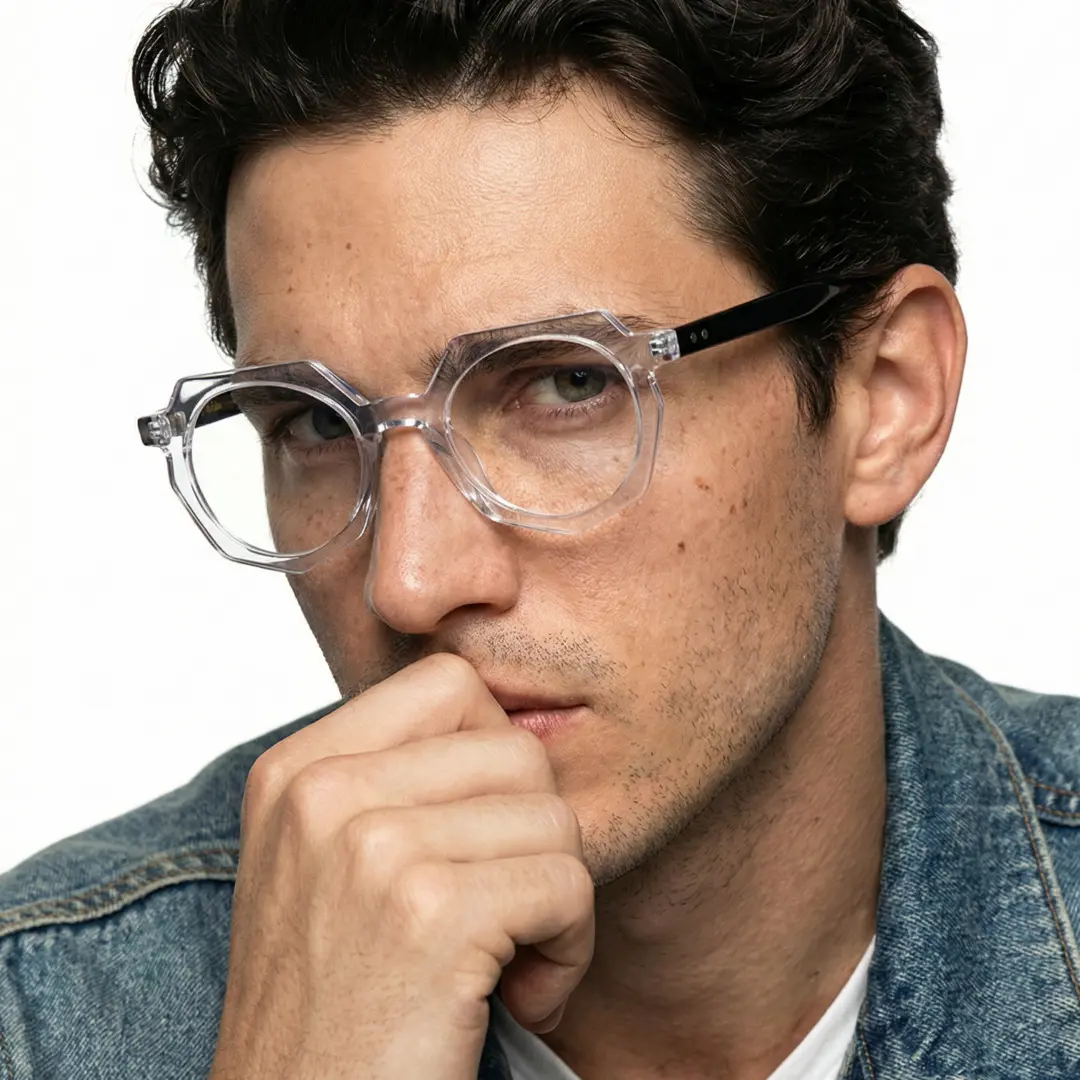 Face close-up view of male wearing vintage clear geometric eyeglasses, confident expression, GA0062309