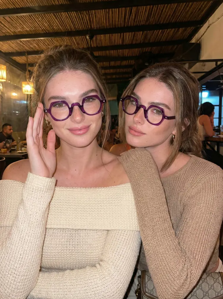 Two people models wearing vintage purple geometric acetate eyeglasses in a restaurant. SPU: GA0082401